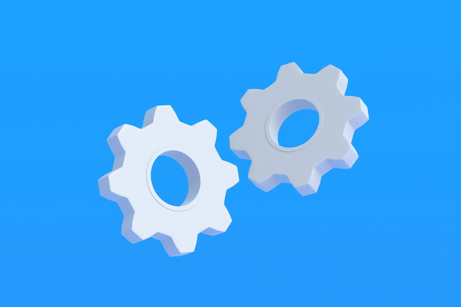 A pair of white 3D gear icons on a blue background